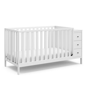 White crib with storage angled