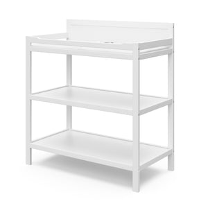 White angled changing table with storage