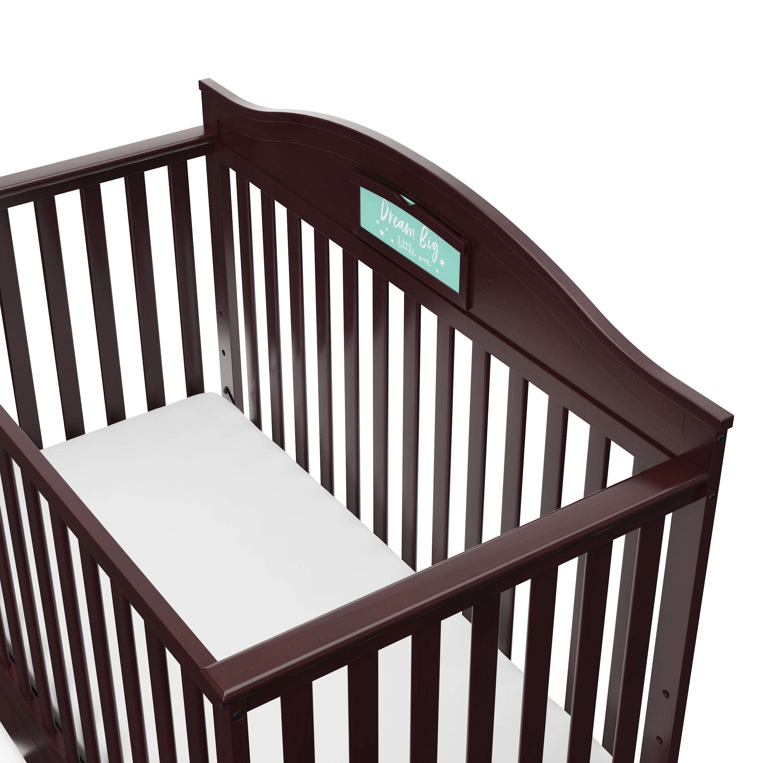Close-up view of espresso crib with drawer