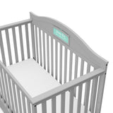 Graco® Story Customizable 5-in-1 Convertible Crib with Drawer.