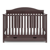 espresso crib with drawer angled