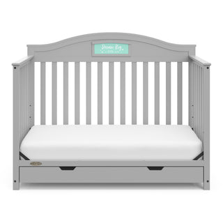 Pebble gray crib with drawer in toddler bed conversion