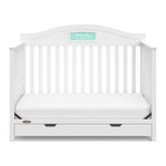 White crib with drawer in toddler bed conversion